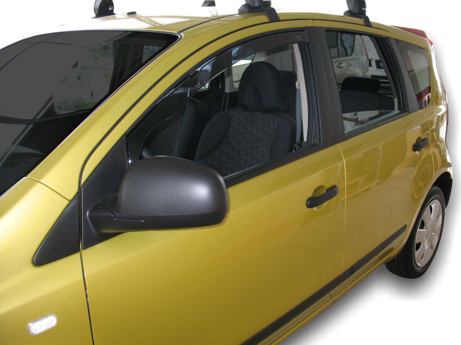 Okenné deflektory Nissan Note 5D HTB 2006-up 4 ks predné+zadné
